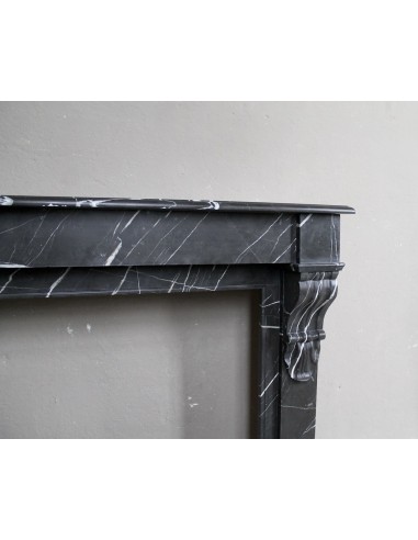 Antique Louis Philippe "Palmettes" fireplace mantel in stunning Black Marquinia marble, with very fine white veins.