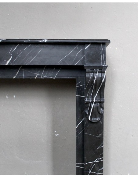 Antique Louis Philippe "Palmettes" fireplace mantel in stunning Black Marquinia marble, with very fine white veins.
