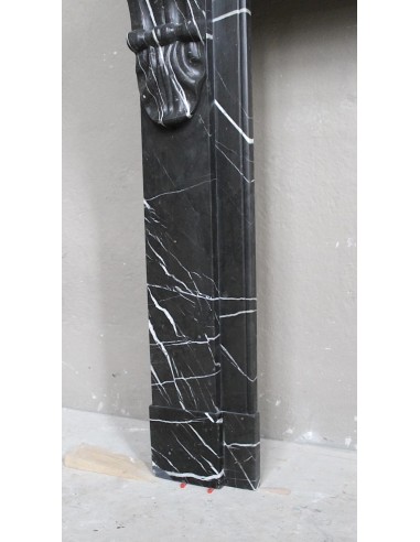 Antique Louis Philippe "Palmettes" fireplace mantel in stunning Black Marquinia marble, with very fine white veins.