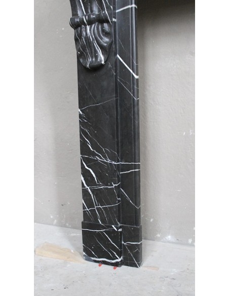 Antique Louis Philippe "Palmettes" fireplace mantel in stunning Black Marquinia marble, with very fine white veins.