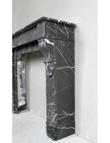 Antique Louis Philippe "Palmettes" fireplace mantel in stunning Black Marquinia marble, with very fine white veins.