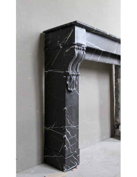 Antique Louis Philippe "Palmettes" fireplace mantel in stunning Black Marquinia marble, with very fine white veins.