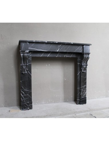 Antique Louis Philippe "Palmettes" fireplace mantel in stunning Black Marquinia marble, with very fine white veins.