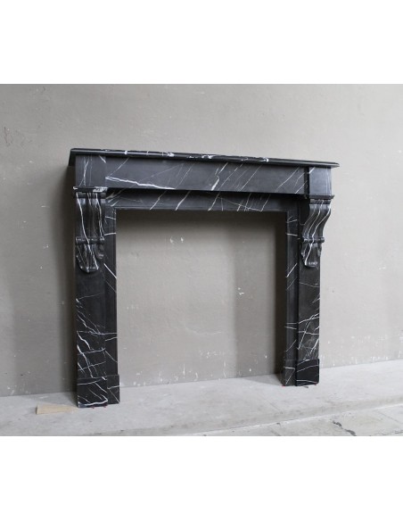 Antique Louis Philippe "Palmettes" fireplace mantel in stunning Black Marquinia marble, with very fine white veins.