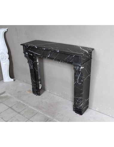Antique Louis Philippe "Palmettes" fireplace mantel in stunning Black Marquinia marble, with very fine white veins.