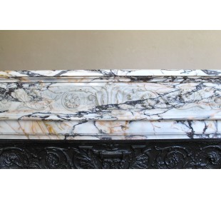 Exceptional antique Neoclassical-style fireplace mantel with fine floral carvings in stunning Italian Calacatta Gold marble. 2