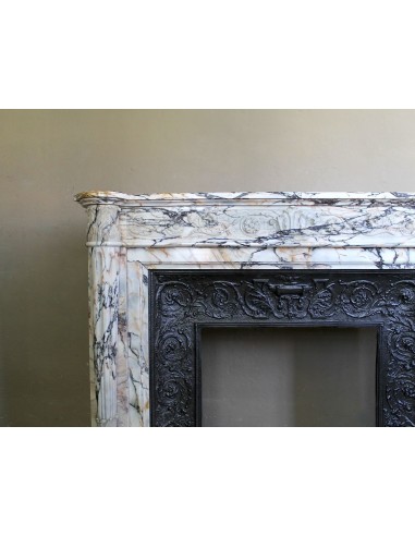 Exceptional antique Neoclassical-style fireplace mantel with fine floral carvings in stunning Italian Calacatta Gold marble.