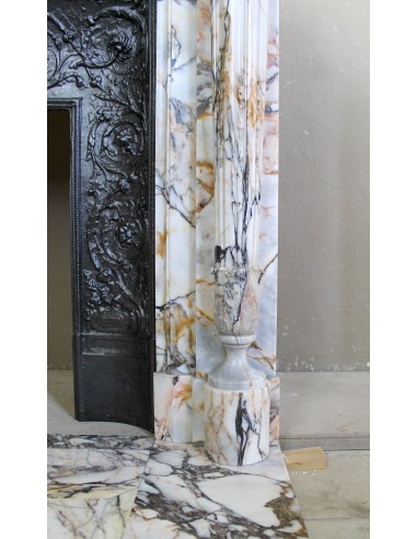 Exceptional antique Neoclassical-style fireplace mantel with fine floral carvings in stunning Italian Calacatta Gold marble.