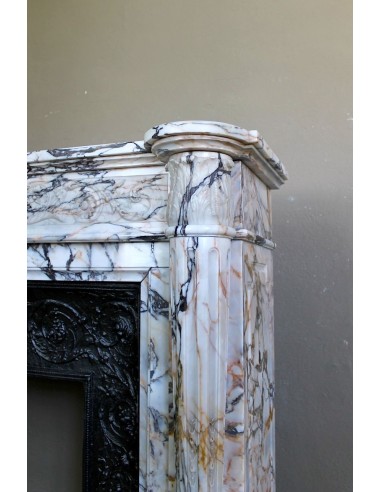 Exceptional antique Neoclassical-style fireplace mantel with fine floral carvings in stunning Italian Calacatta Gold marble.