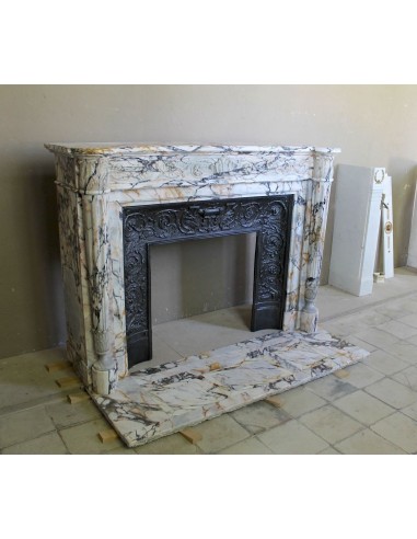 Exceptional antique Neoclassical-style fireplace mantel with fine floral carvings in stunning Italian Calacatta Gold marble.