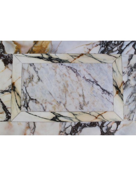 Exceptional antique Neoclassical-style fireplace mantel with fine floral carvings in stunning Italian Calacatta Gold marble.