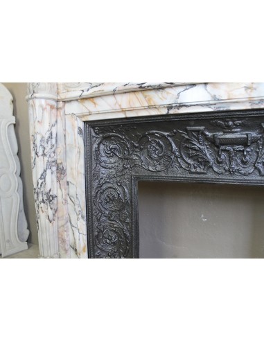 Exceptional antique Neoclassical-style fireplace mantel with fine floral carvings in stunning Italian Calacatta Gold marble.