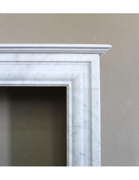 Antique "Boudin Carré" fireplace mantel with elegant and refined lines, in a beautiful quality of White Carrara marble.