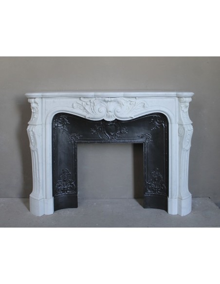 Antique Louis XV "Rosaces" fireplace mantel carved in top-quality White Carrara marble, extremely pure and refined.