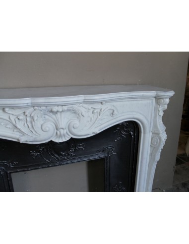 Antique Louis XV "Rosaces" fireplace mantel carved in top-quality White Carrara marble, extremely pure and refined.