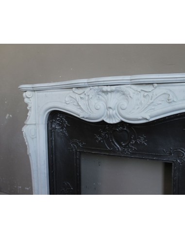 Antique Louis XV "Rosaces" fireplace mantel carved in top-quality White Carrara marble, extremely pure and refined.
