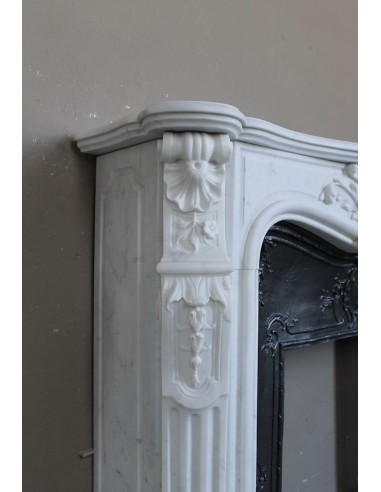 Antique Louis XV "Rosaces" fireplace mantel carved in top-quality White Carrara marble, extremely pure and refined.