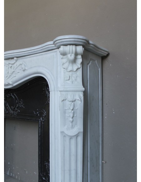 Antique Louis XV "Rosaces" fireplace mantel carved in top-quality White Carrara marble, extremely pure and refined.