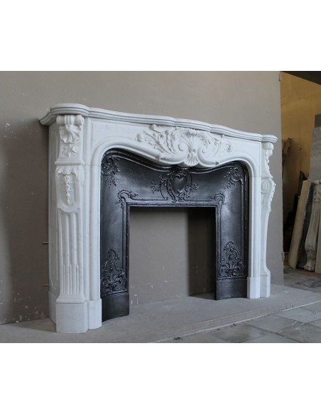 Antique Louis XV "Rosaces" fireplace mantel carved in top-quality White Carrara marble, extremely pure and refined.