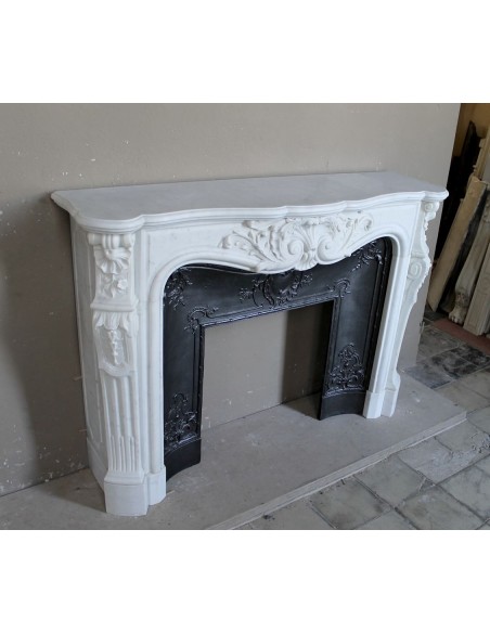 Antique Louis XV "Rosaces" fireplace mantel carved in top-quality White Carrara marble, extremely pure and refined.