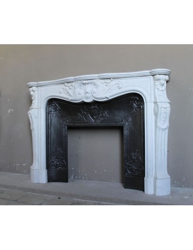 Antique Louis XV "Rosaces" fireplace mantel carved in top-quality White Carrara marble, extremely pure and refined.