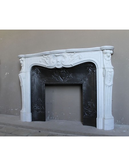 Antique Louis XV "Rosaces" fireplace mantel carved in top-quality White Carrara marble, extremely pure and refined.