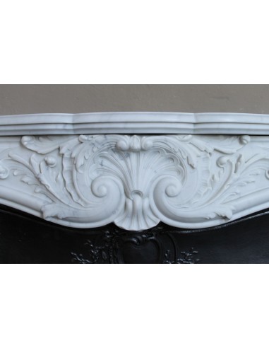 Antique Louis XV "Rosaces" fireplace mantel carved in top-quality White Carrara marble, extremely pure and refined.