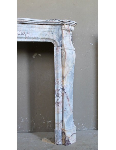 Antique Baroque style fireplace mantel in  beautiful Calacatta Gold marble. This is a rare and elegant marble fire surround.