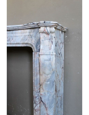 Antique Baroque style fireplace mantel in  beautiful Calacatta Gold marble. This is a rare and elegant marble fire surround.
