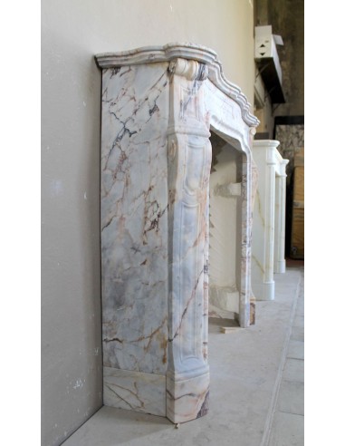 Antique Baroque style fireplace mantel in  beautiful Calacatta Gold marble. This is a rare and elegant marble fire surround.