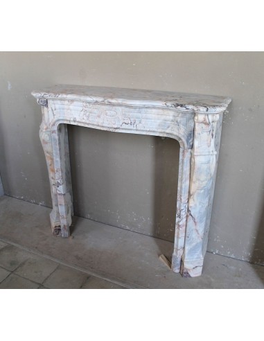Antique Baroque style fireplace mantel in  beautiful Calacatta Gold marble. This is a rare and elegant marble fire surround.