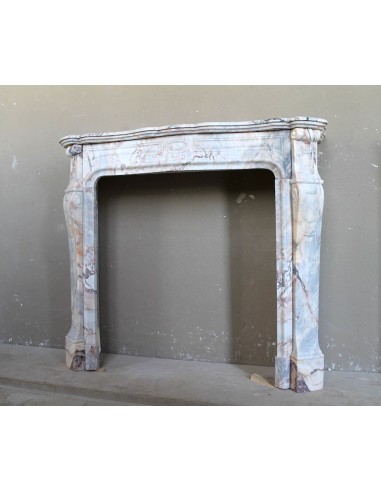 Antique Baroque style fireplace mantel in  beautiful Calacatta Gold marble. This is a rare and elegant marble fire surround.
