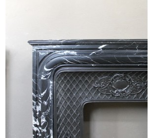 Antique "Boudin Arrondi" fireplace mantel in Black Marquinia veined marble provided with its original cast iron insert. 2