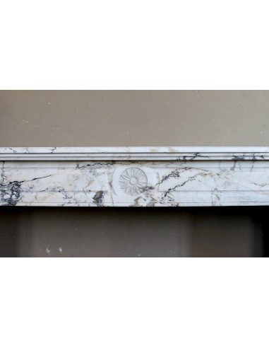 Antique neoclassical fireplace mantel in rare and elegant Calacatta Gold marble. This marble fire surround comes from Paris.
