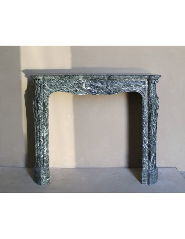 Antique Baroque-style fire surround in green Verde Alpi marble, dating back to the 19th century. This is a truly antique mantel.