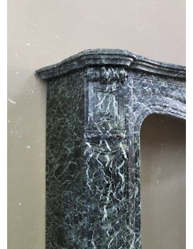 Antique Baroque-style fire surround in green Verde Alpi marble, dating back to the 19th century. This is a truly antique mantel.