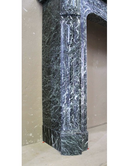 Antique Baroque-style fire surround in green Verde Alpi marble, dating back to the 19th century. This is a truly antique mantel.