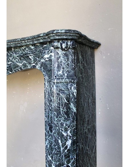 Antique Baroque-style fire surround in green Verde Alpi marble, dating back to the 19th century. This is a truly antique mantel.