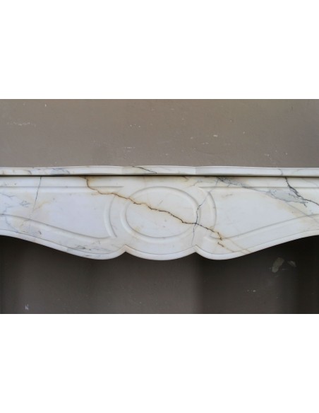 Antique Louis XV "Pompadour Plat" fireplace mantel in rare Paonazzo marble, a gorgeous white marble with golden veins.