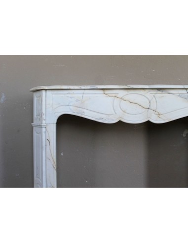 Antique Louis XV "Pompadour Plat" fireplace mantel in rare Paonazzo marble, a gorgeous white marble with golden veins.