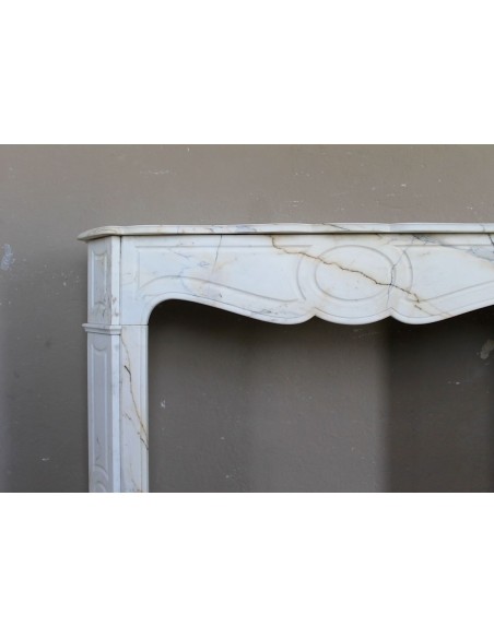 Antique Louis XV "Pompadour Plat" fireplace mantel in rare Paonazzo marble, a gorgeous white marble with golden veins.