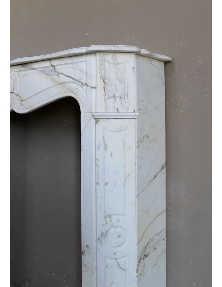 Antique Louis XV "Pompadour Plat" fireplace mantel in rare Paonazzo marble, a gorgeous white marble with golden veins.
