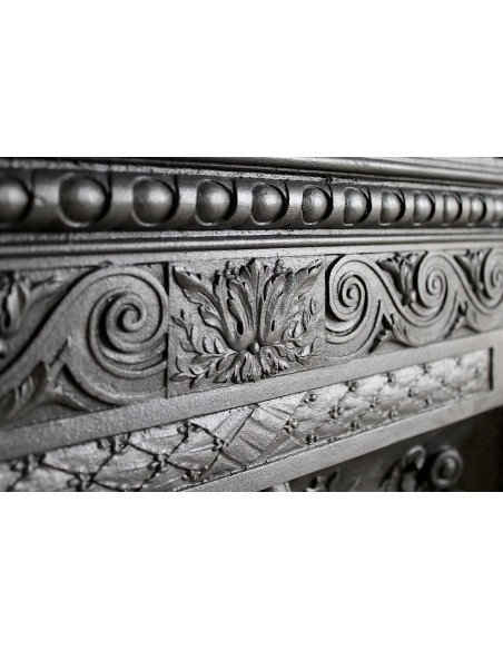 Antique cast iron mantelpiece from Paris. This Art Nouveau style fire surround dates back to the XXth century.