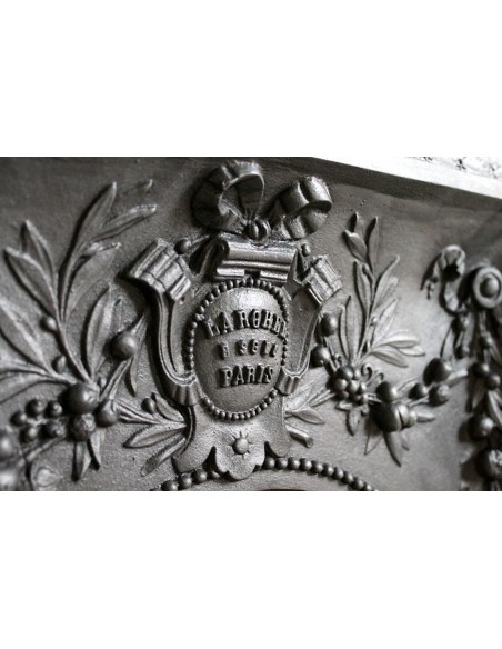 Antique cast iron mantelpiece from Paris. This Art Nouveau style fire surround dates back to the XXth century.