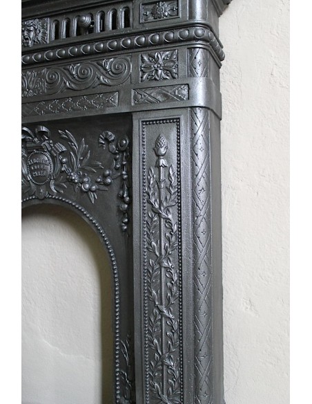 Antique cast iron mantelpiece from Paris. This Art Nouveau style fire surround dates back to the XXth century.