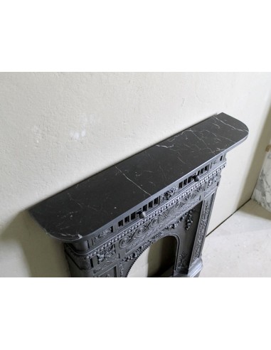 Antique cast iron mantelpiece from Paris. This Art Nouveau style fire surround dates back to the XXth century.