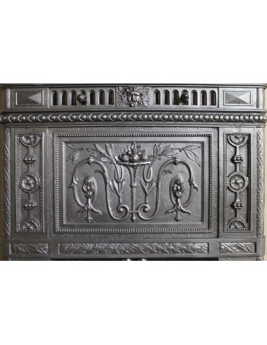 Antique “Larcher” cast iron mantelpiece with floral decorations. A refined, elegant, 19th-century antique fire surround.