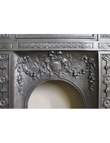 Antique “Larcher” cast iron mantelpiece with floral decorations. A refined, elegant, 19th-century antique fire surround.