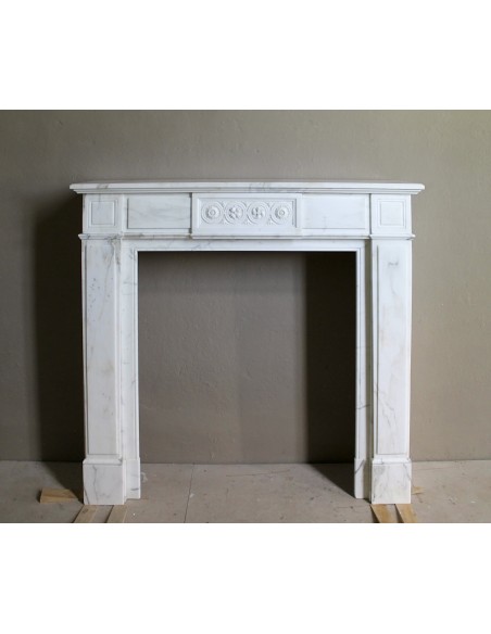 Antique neoclassical "Macaron" mantelpiece carved in Statuary Carrara marble, with exquisite architectural design.