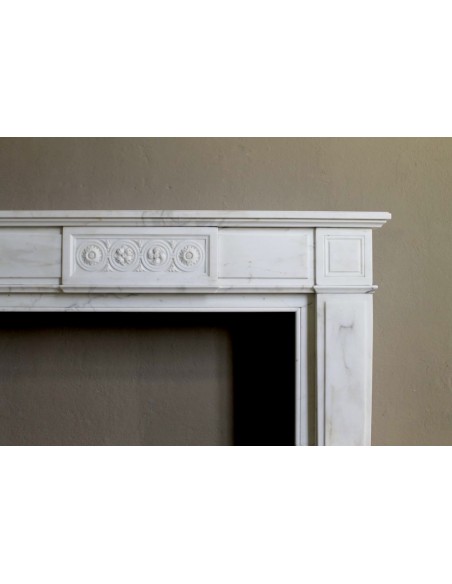 Antique neoclassical "Macaron" mantelpiece carved in Statuary Carrara marble, with exquisite architectural design.